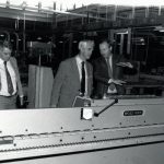Kurt Waldthausen with Gero Sassenburg and Dean Eric Ellwood examining edge bander machine